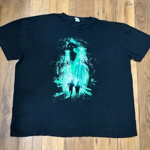 Black T-Shirt with Green Alien Graphic